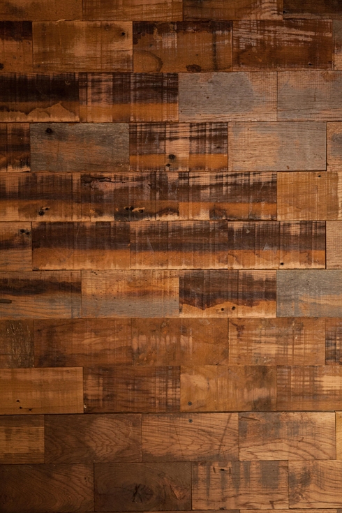 Wall built by Southern Accents from salvaged wood blocks.